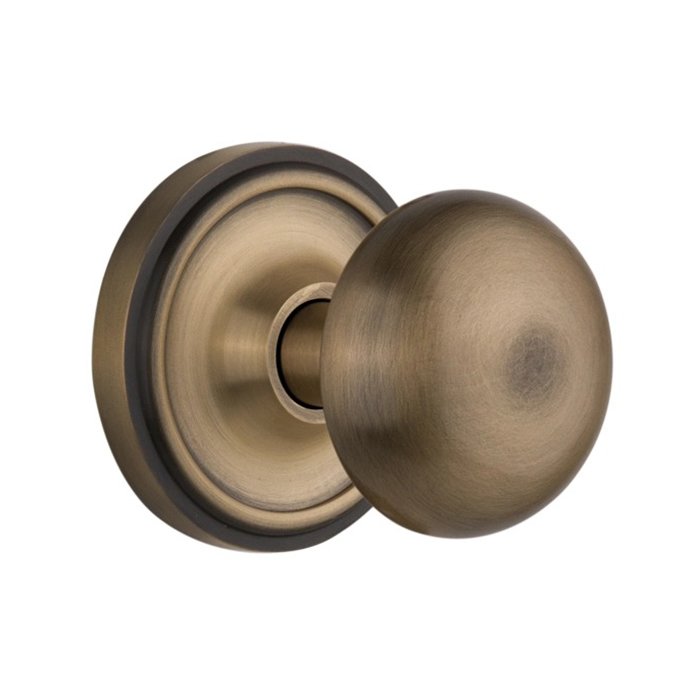 Nostalgic Warehouse Privacy Classic Rosette with New York Door Knob in Antique Brass