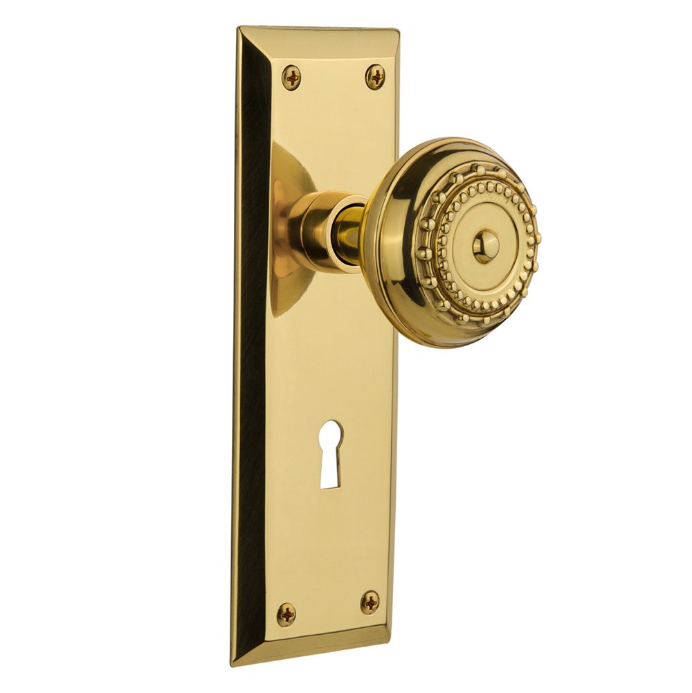 Nostalgic Warehouse Passage New York Plate with Keyhole and Meadows Door Knob in Polished Brass