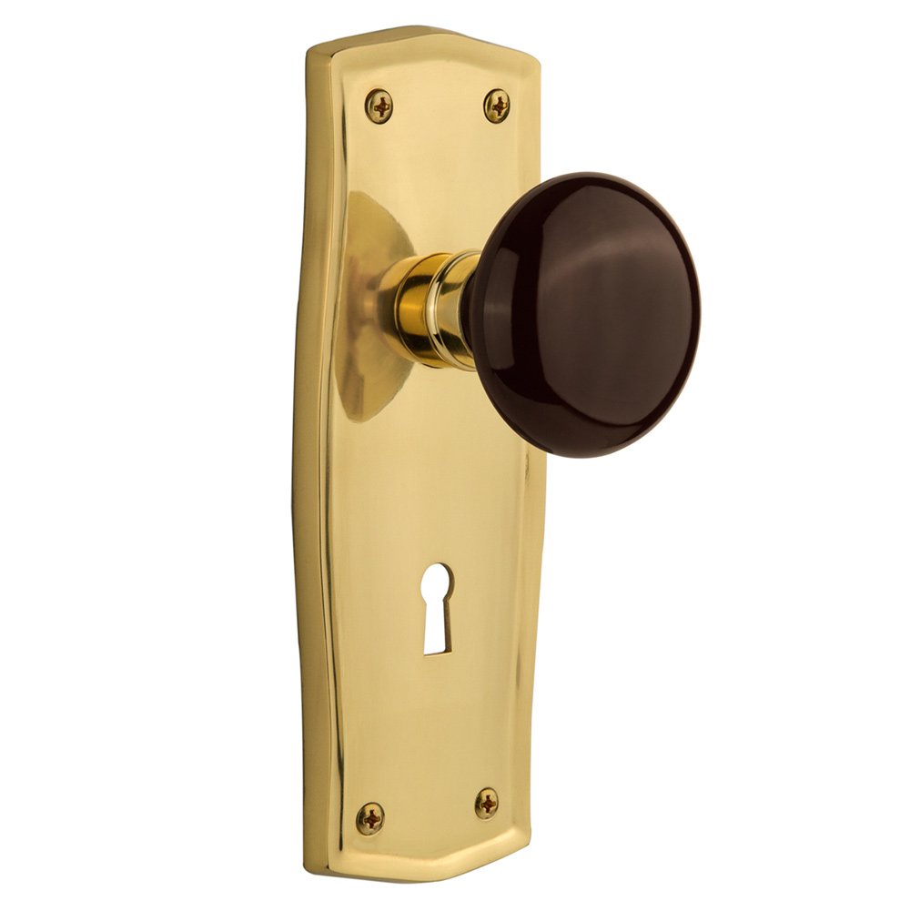 Nostalgic Warehouse Privacy Prairie Plate with Keyhole and Brown Porcelain Door Knob in Unlacquered Brass