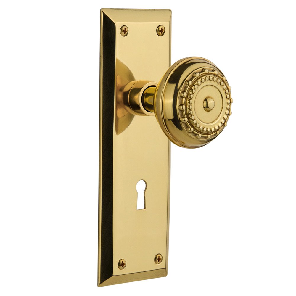 Nostalgic Warehouse Double Dummy New York Plate with Keyhole and Meadows Door Knob in Polished Brass