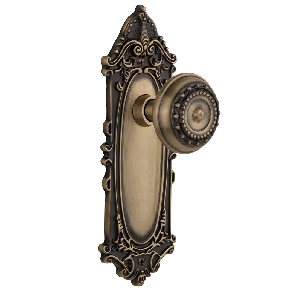 Nostalgic Warehouse Privacy Victorian Plate with Meadows Door Knob in Antique Brass