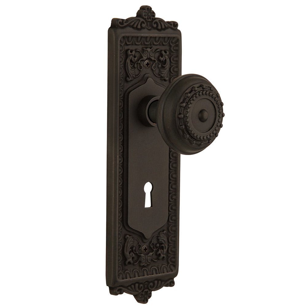 Nostalgic Warehouse Privacy Egg & Dart Plate with Keyhole and Meadows Door Knob in Oil-Rubbed Bronze