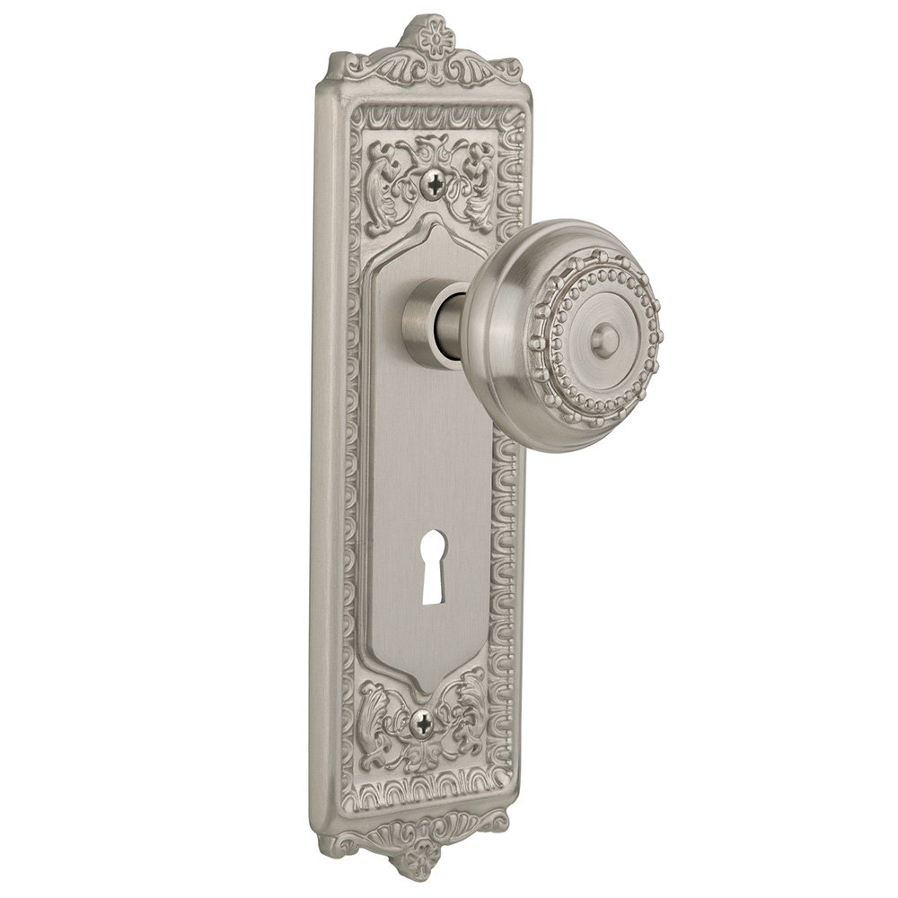 Nostalgic Warehouse Privacy Egg & Dart Plate with Keyhole and Meadows Door Knob in Satin Nickel