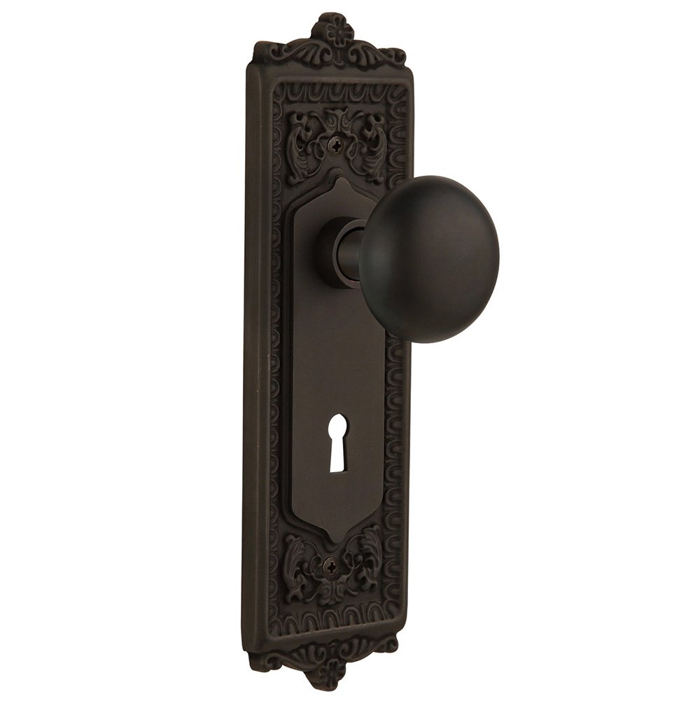 Nostalgic Warehouse Privacy Egg & Dart Plate with Keyhole and New York Door Knob in Oil-Rubbed Bronze