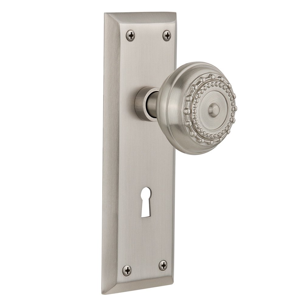 Nostalgic Warehouse Privacy New York Plate with Keyhole and Meadows Door Knob in Satin Nickel