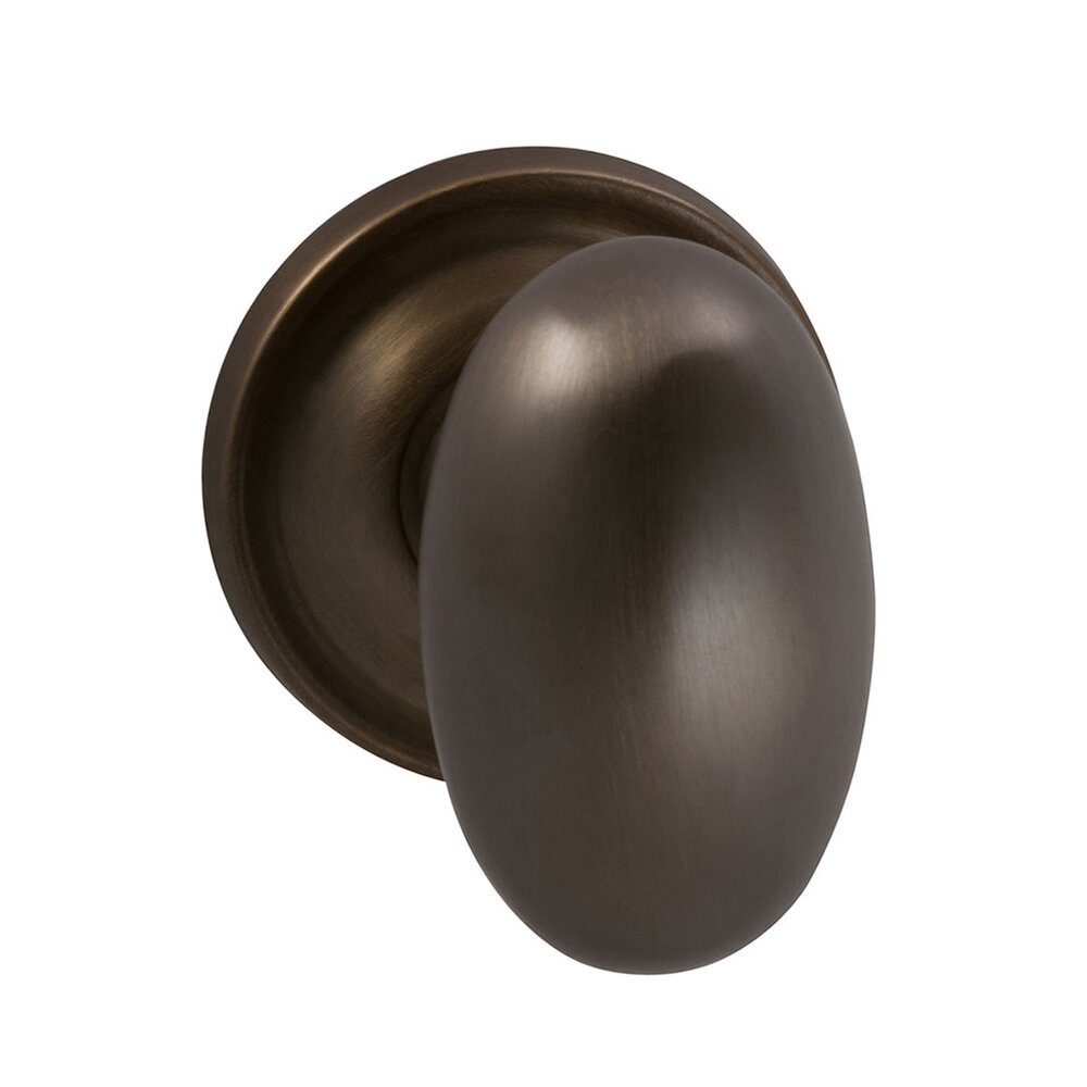 Omnia Hardware Single Dummy Traditions Classic Egg Door Knob with Medium Radial Rosette in Antique Bronze Unlacquered