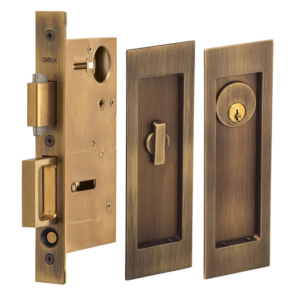 Omnia Hardware Large Modern Rectangular Keyed Pocket Door Mortise Lock in Antique Brass Lacquered