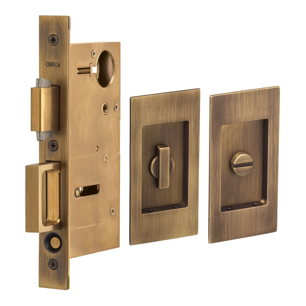 Omnia Hardware Small Modern Rectangle Privacy Pocket Door Mortise Lock in Antique Brass Lacquered