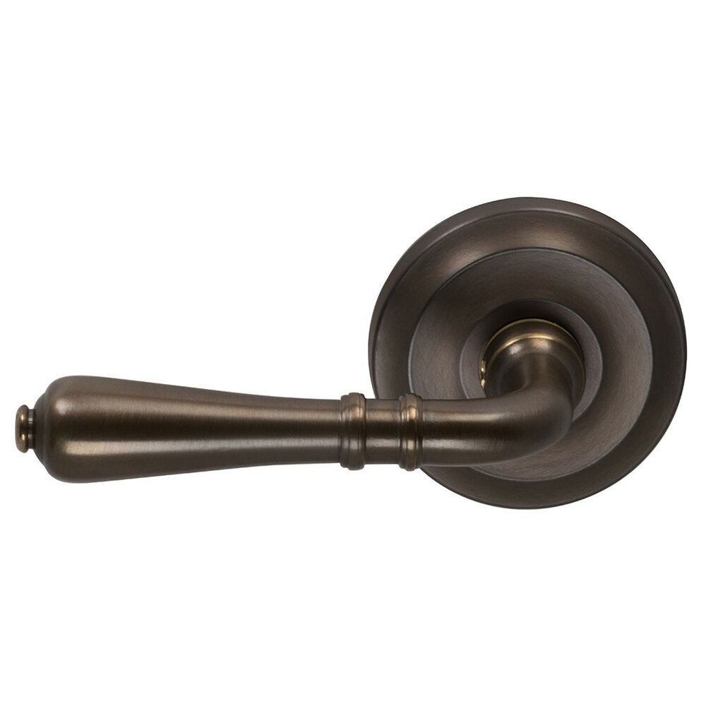 Omnia Hardware Passage Traditions Left Handed Lever with Radial Rosette in Antique Bronze Unlacquered