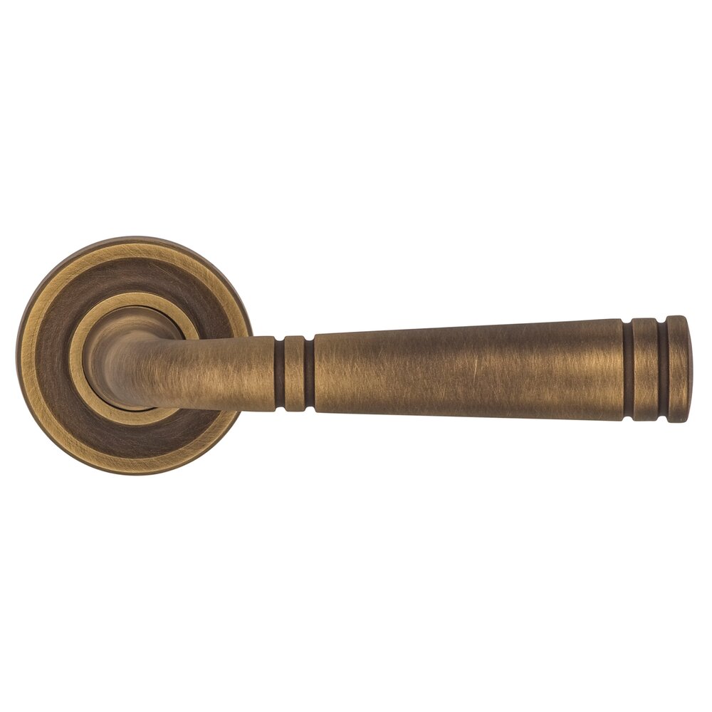 Omnia Hardware Privacy Edged Lever and Small Edged Rose in Antique Brass Lacquered