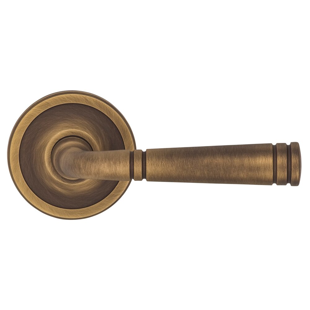 Omnia Hardware Privacy Edged Lever Edged Rose in Antique Brass Lacquered