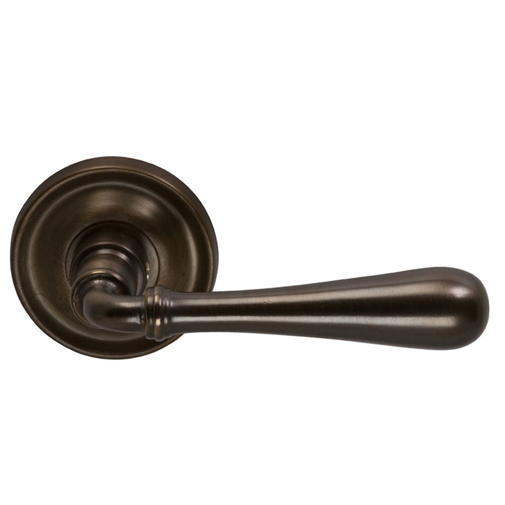 Omnia Hardware Passage Traditions Timeless Lever with Medium Radial Rosette in Antique Bronze Unlacquered