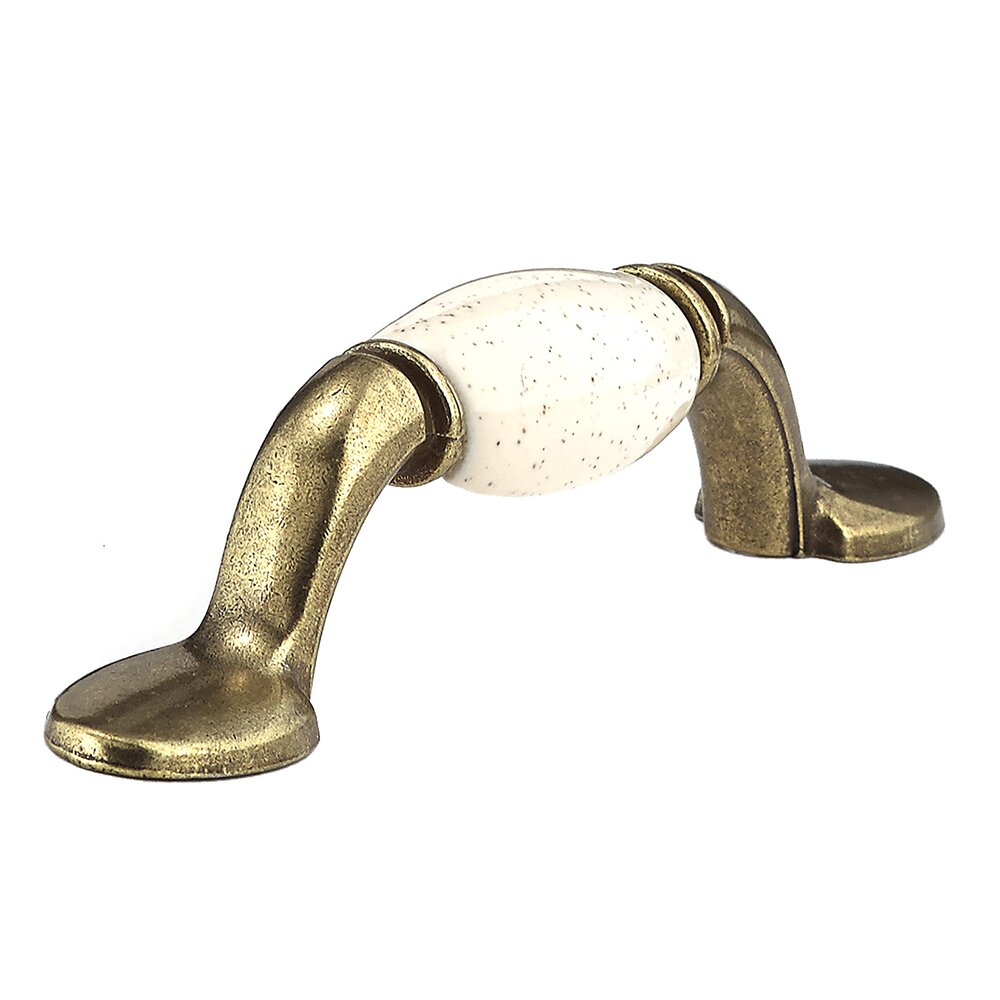 Richelieu 3" Centers Ceramic Inlayed Bow Pull in Burnished Brass and Oatmeal