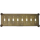 Oceanus Switchplate Eight Gang Toggle Switchplate in Bronze with Verde Wash