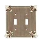 Fleur De Lis Double Toggle Switchplate in Satin Pearl