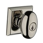 Keyed Ellipse Door Knob with Traditional Square Rose in Polished Nickel