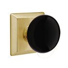Passage Ebony Porcelain Knob With Quincy Rosette in Satin Brass