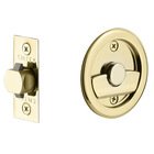 Tubular Round Privacy Pocket Door Lock in Unlacquered Brass