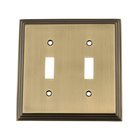 Double Toggle Switchplate in Antique Brass